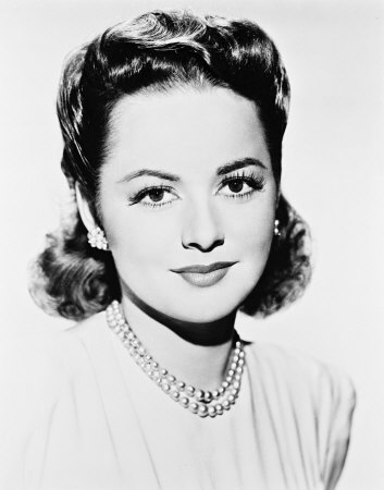 Olivia de Havilland cast as the main characters Peter Blood and